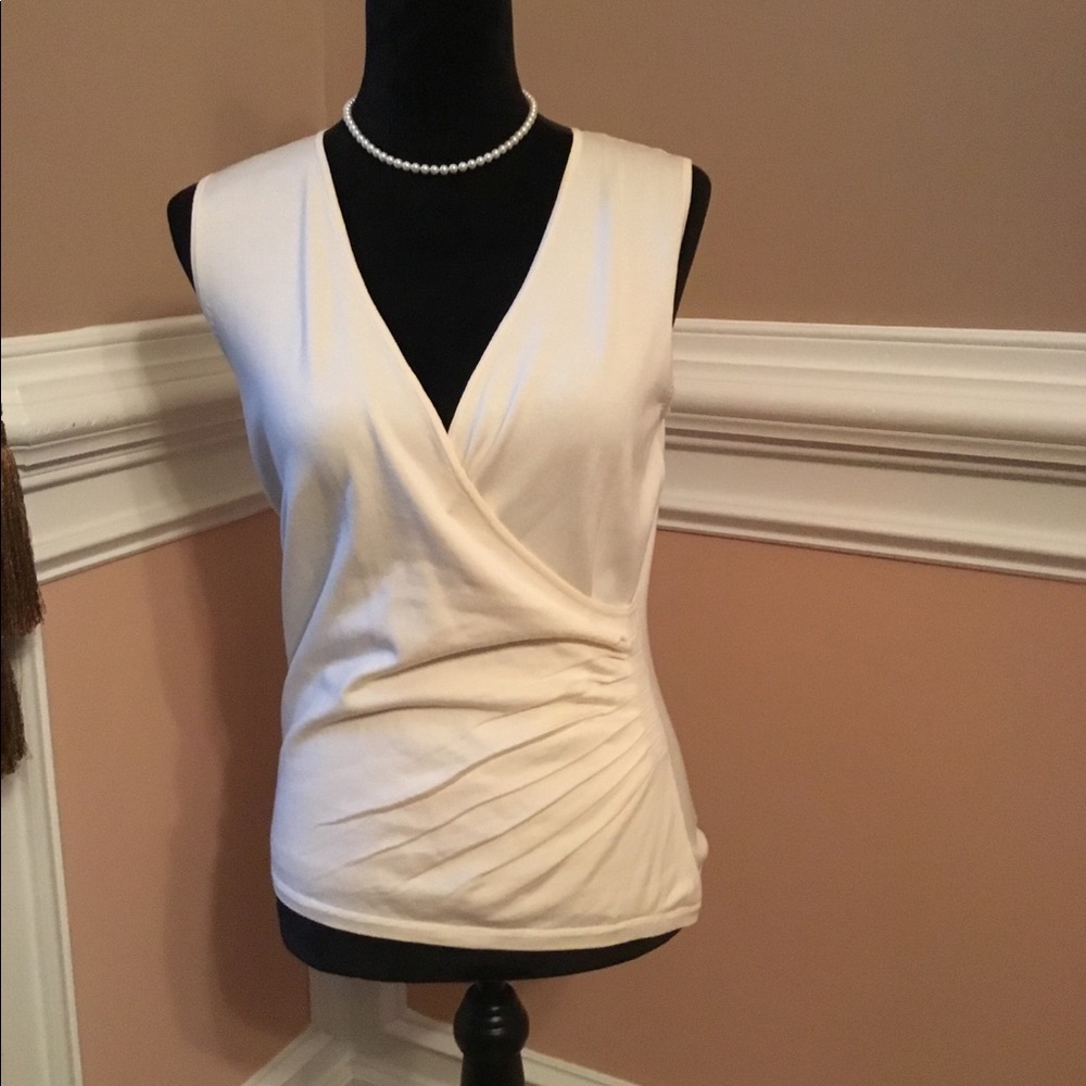 Ann Taylor cream sleeveless top.